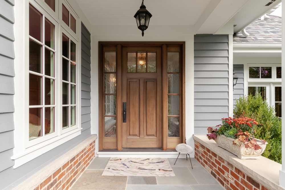 A,Front,Door,And,Covered,Porch,Detail,On,A,Home
